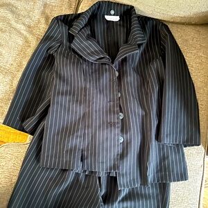 Two piece pinstriped blazer and dress pants set